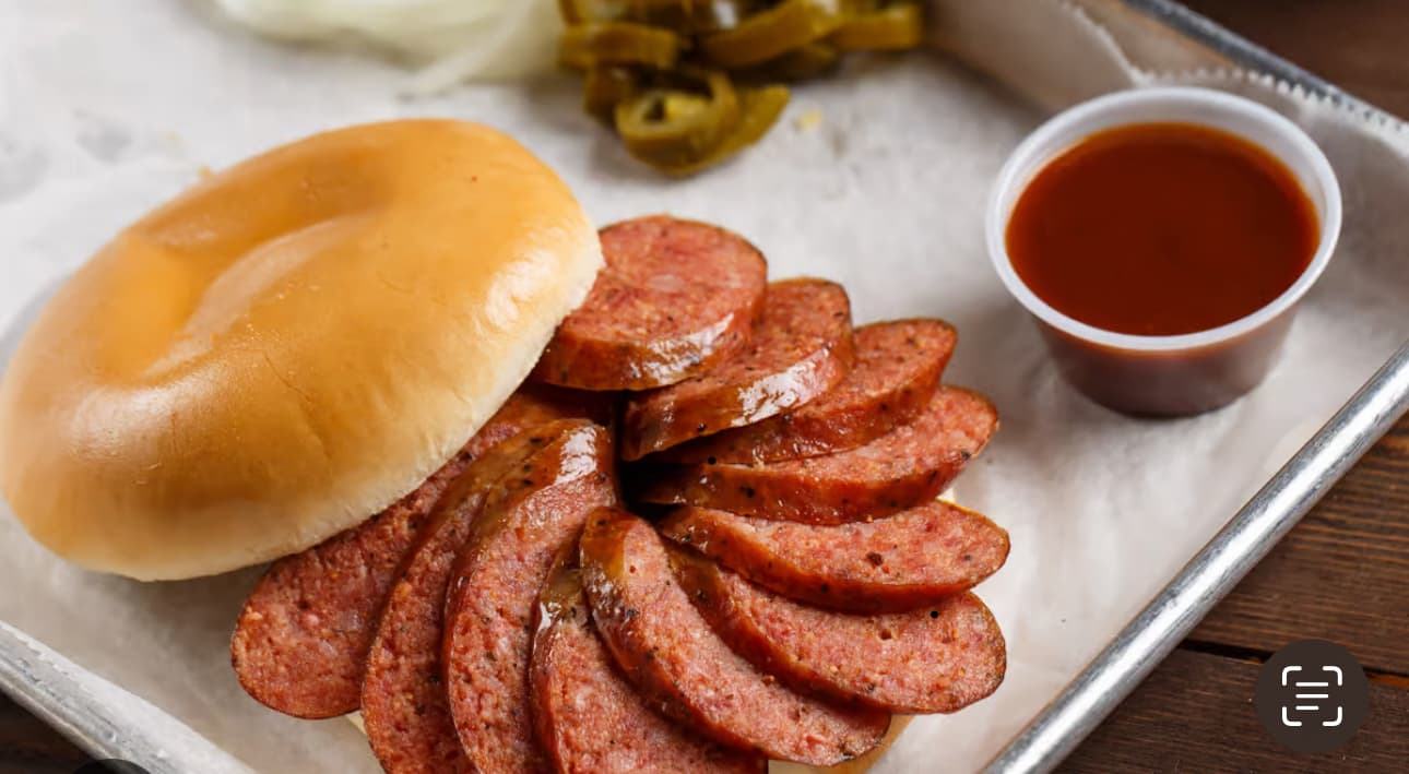 Sausage on a Bun with Sauce